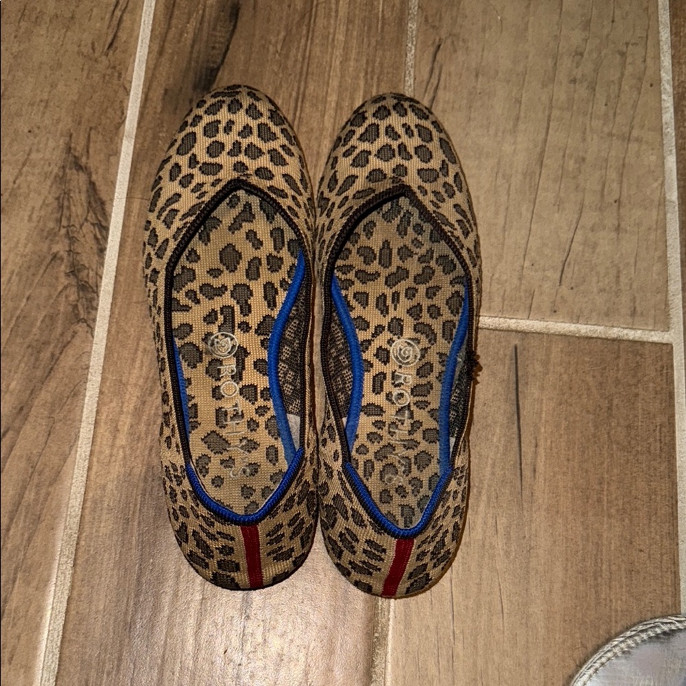Rothy’s Leopard Print Flats with Red and Blue Accents